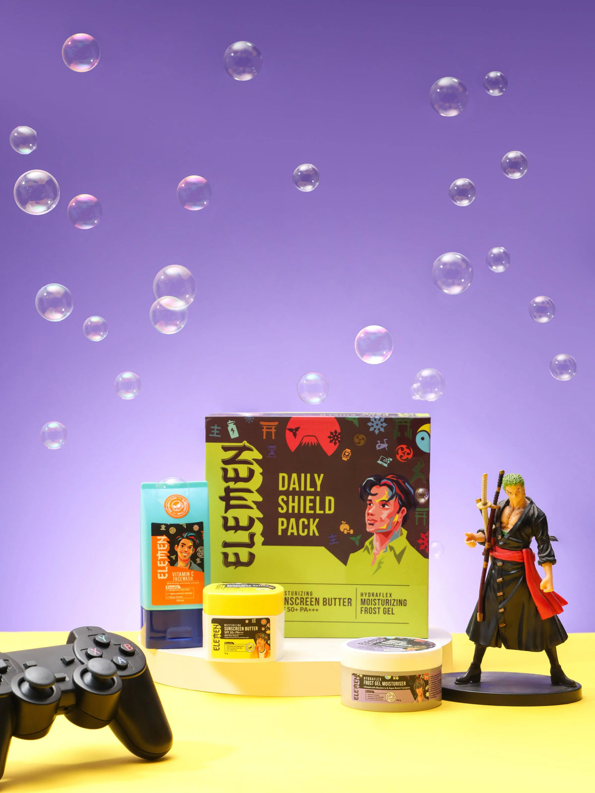 Skincare gifting set products and a figurine on a yellow surface with a purple background